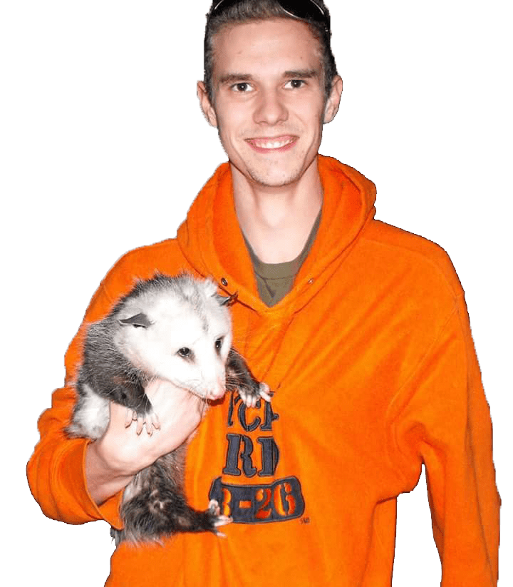 Brandon with an opossum